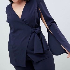This is ASOS curve tie waist tailored cape blazer with stretchy tailored pant